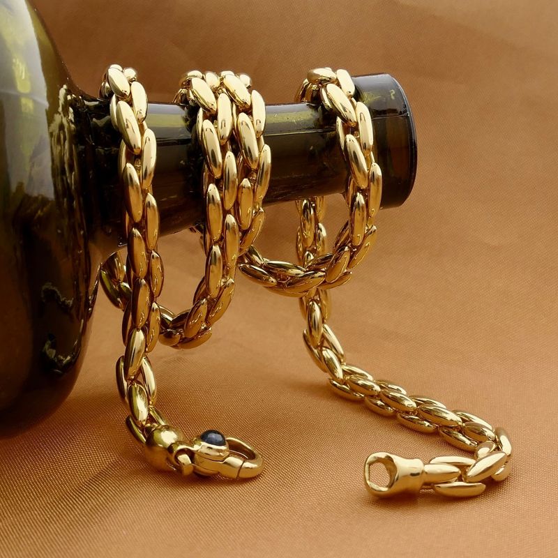 Afbeelding 2 van Gouden cardano schakelketting met saffier