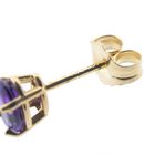 Image 9 of Gold stud earrings with synthetic purple gemstone