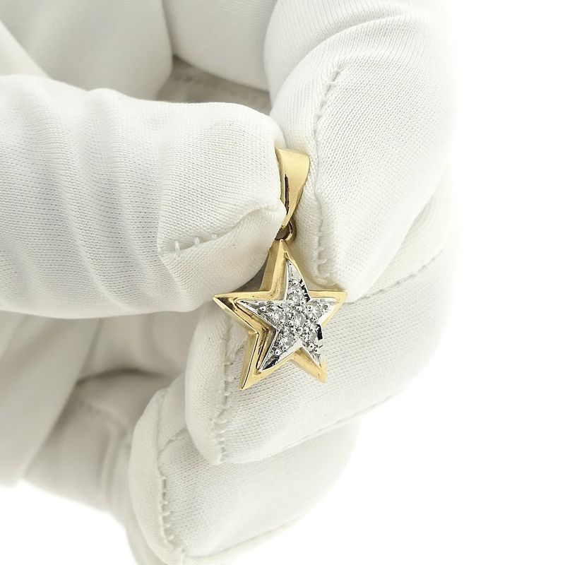 Image 11 of Two-tone gold subtle star pendant with diamond | 0.06 ct.