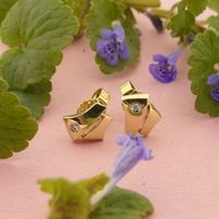 Gold stud earrings with diamond; 0.02 ct.