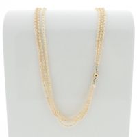 Pearl necklace with gold clasp.