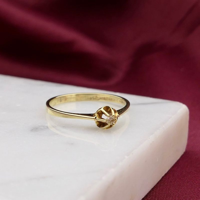 Image 2 of Gold solitaire ring with diamond; 0.02 ct.