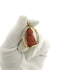 Image 2 of 18-karat two-tone gold Buddhist pendant with blood coral and diamond | approx. 0.08 ct.