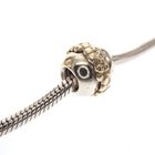 Image 2 of Pandora charm; Silver with gold; Saturn Flower