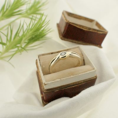 Two-tone gold ring with 0.08 ct diamond. Image 2 of Two-tone gold ring with 0.08 ct diamond.