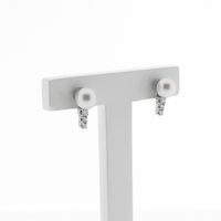 White gold stud earrings set with diamonds and a pearl | 0.17 ct.