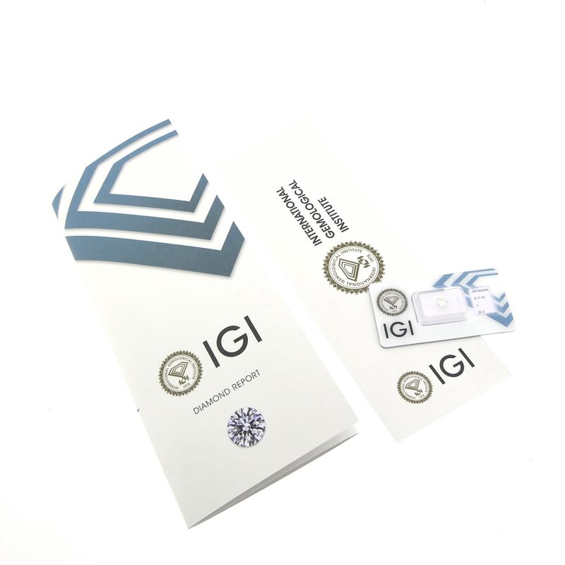 Image 4 of 0.71 ct. Brilliant cut diamond; Color J; Quality SI2 + IGI Certificate