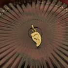 Image 5 of Gold pendant of a half heart with a woman