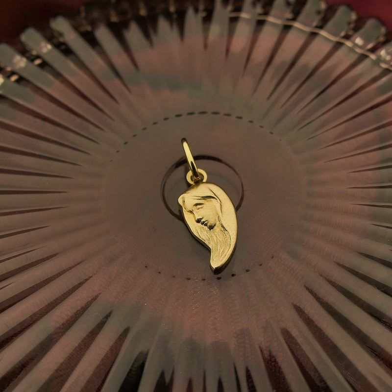 Image 5 of Gold pendant of a half heart with a woman