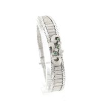 White gold bracelet with emerald and diamonds; 0.045 ct.