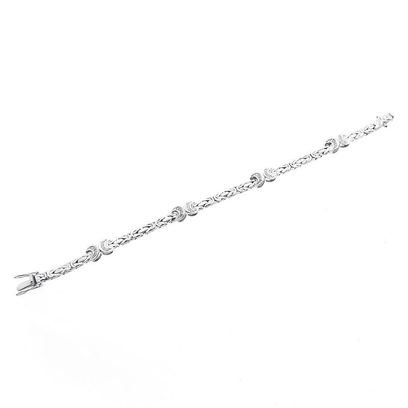 Image 9 of White gold flat king bracelet with fixed charms and 0.24 ct diamond.