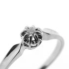 Image 6 of White gold solitaire ring with 0.06 ct diamond.