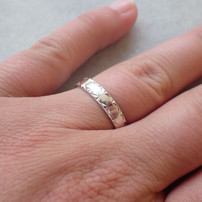 Image 2 of Silver ring with facets