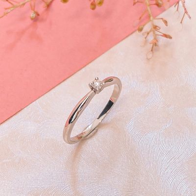 Image 2 of White gold solitaire ring with 0.06 ct diamond.