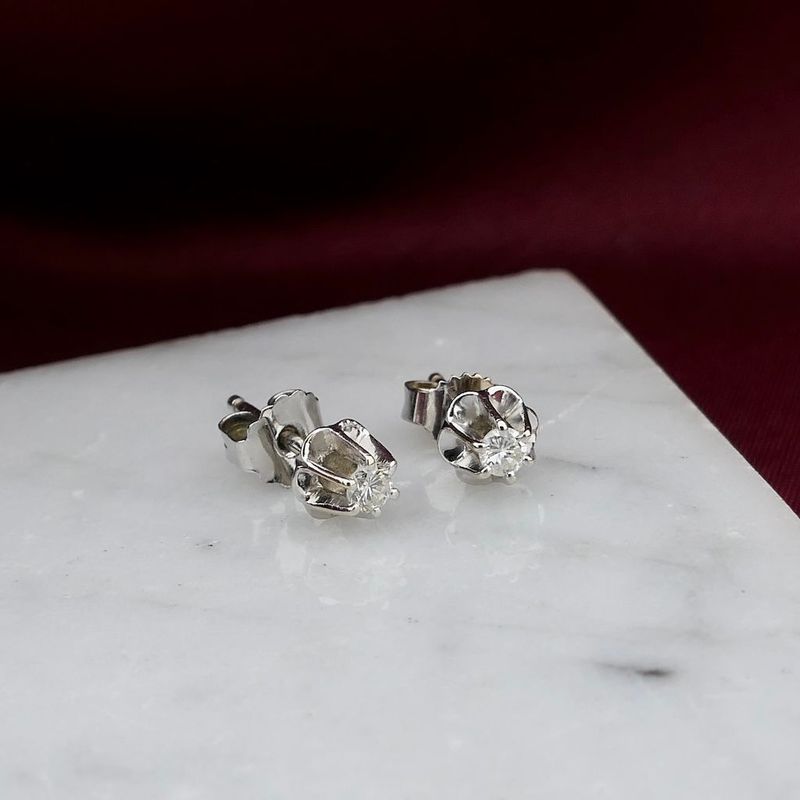 Image 2 of White gold solitaire stud earrings with diamond; 0.14 ct.