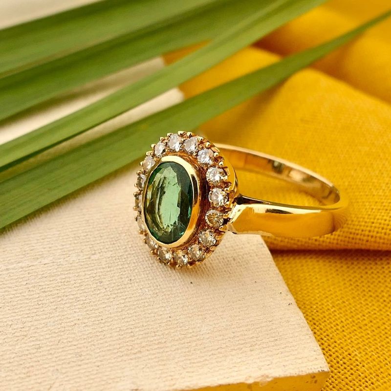Image 2 of Gold ring with emerald and diamonds; 0.32 ct.