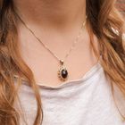 Image 4 of Vintage gold pendant with oval garnet