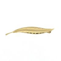 Gold feather brooch