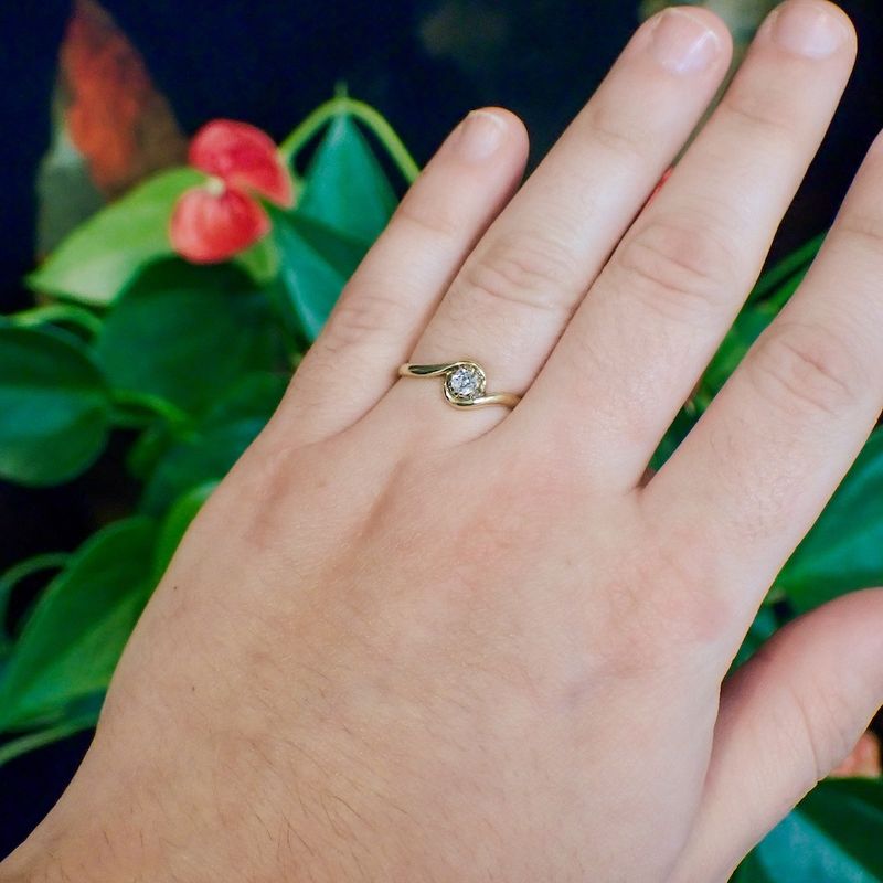 Image 4 of Golden subtle ring with diamond 0.13 ct.