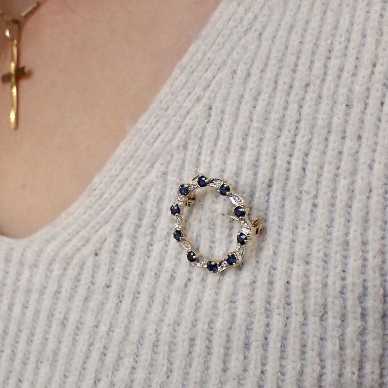 Image 7 of Gold brooch with sapphire and diamonds | 0.05 ct.