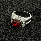 Image 2 of Silver cluster ring with red zirconia.