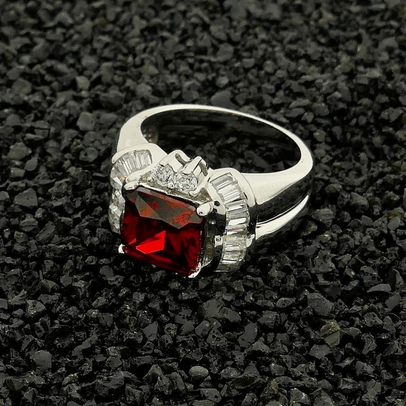 Image 2 of Silver cluster ring with red zirconia.