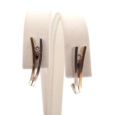 Bicolor gold stud earrings with diamond 0.07 ct. Image 1 of Bicolor gold stud earrings with diamond 0.07 ct.