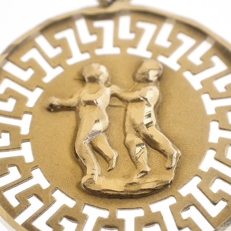 Image 5 of 18 kt gold pendant of the Gemini zodiac sign