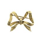 Image 1 of Gold brooch; Bow
