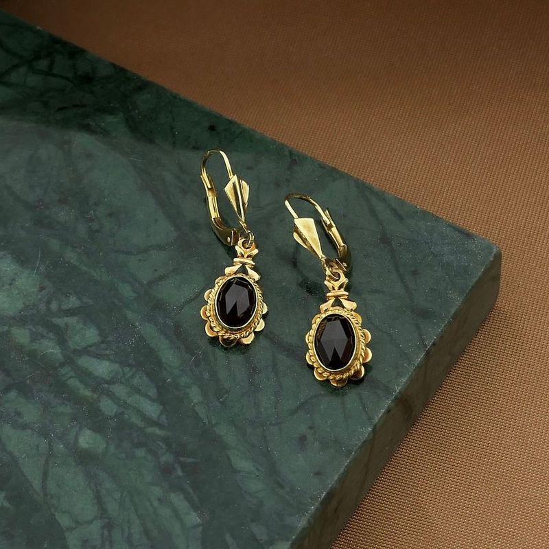 Image 2 of Gold earrings with garnet