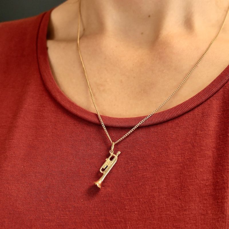 Image 5 of Gold pendant of a trumpet