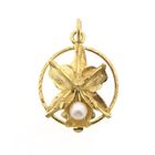 Image 1 of 18 carat gold pendant of lily with pearl