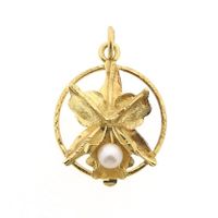 18 carat gold pendant of lily with pearl