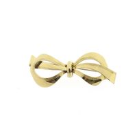 Vintage gold brooch | Bow