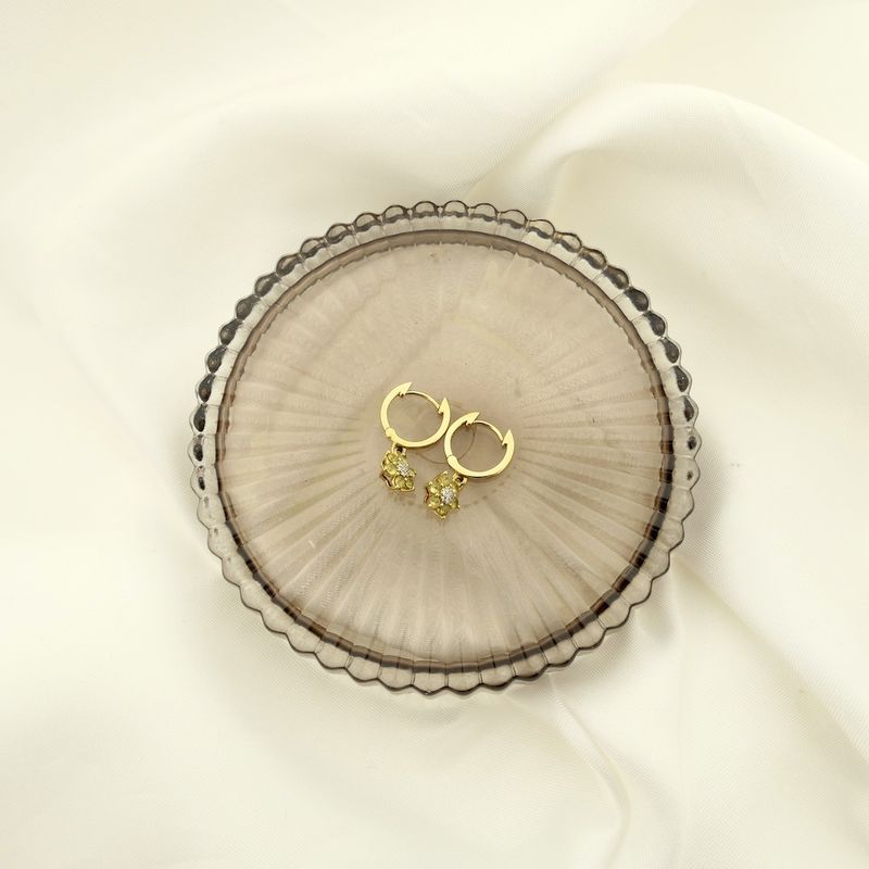 Image 2 of Gold earrings with peridot and diamond | 0.04 ct.