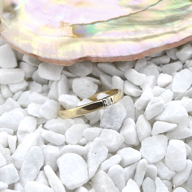 Image 8 of 18 carat gold solitaire ring with 0.05 ct diamond.