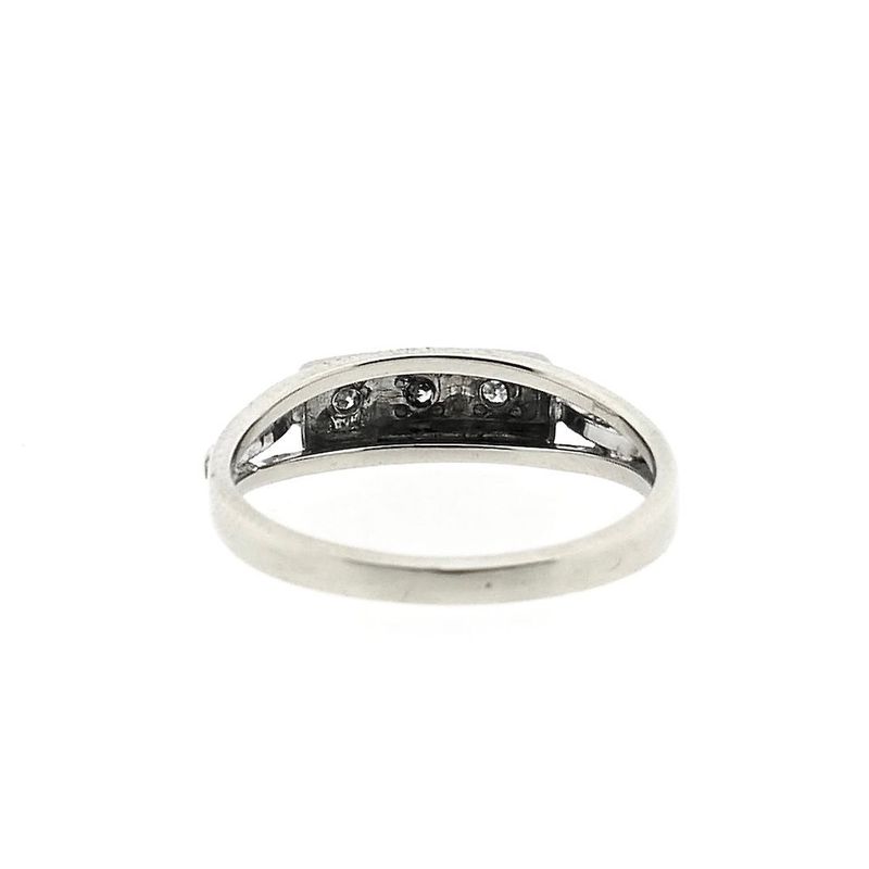 Image 4 of White gold ring with 0.06 ct diamond.