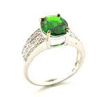 Image 1 of 9 carat ring with a green zirconia and zirconia