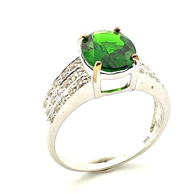 9 carat ring with a green zirconia and zirconia Image 1 of 9 carat ring with a green zirconia and zirconia