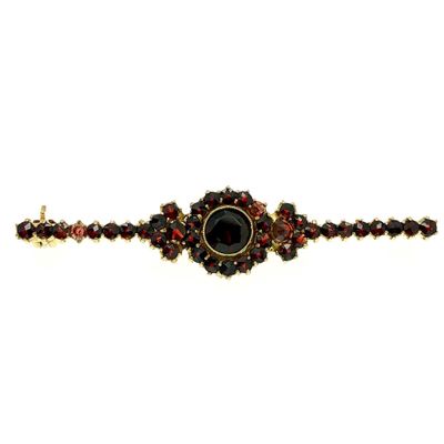 Image 1 of Vintage gold brooch with garnet stones