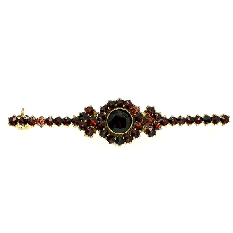 Image 1 of Vintage gold brooch with garnet stones