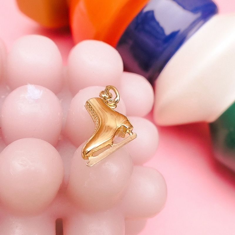 Image 5 of Two-tone gold pendant of a skate