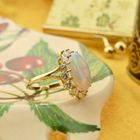 Image 2 of Gold ring with opal and diamond; 1.26 ct.