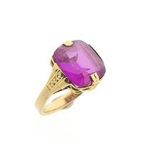 Gold pinky ring with synthetic magenta ruby