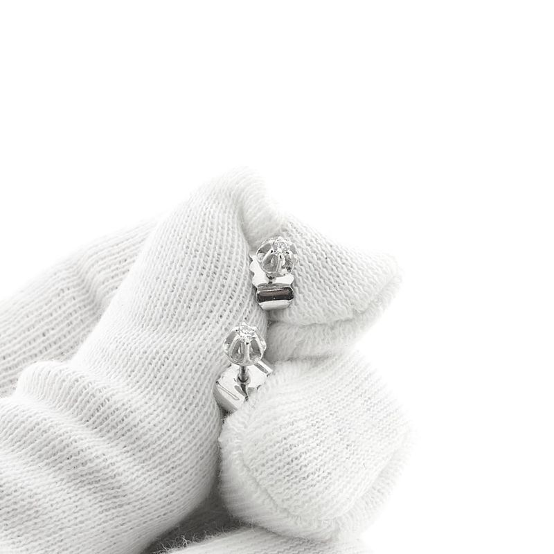 Image 8 of White gold solitaire stud earrings with diamond | 0.05 ct.