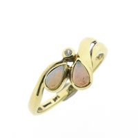 Gold ring with white opal and zirconia