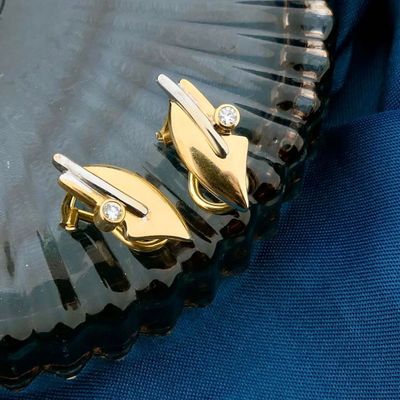 Image 2 of Two-tone gold clip-on earrings with diamonds; 0.04 ct.