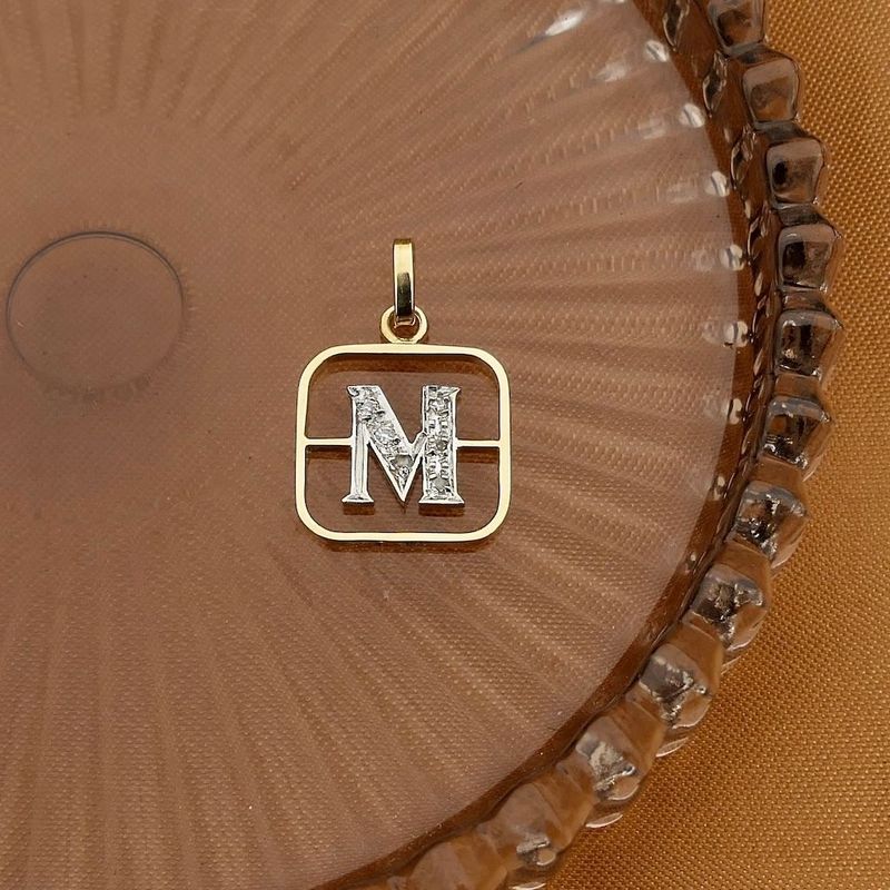 Image 2 of Two-tone gold pendant of the letter M with diamonds; 0.03 ct.