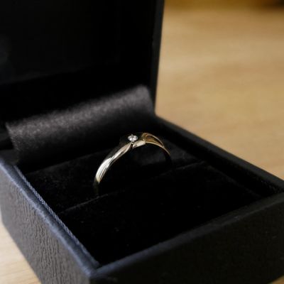 Image 2 of Two-tone gold solitaire ring with diamond | 0.02 ct.