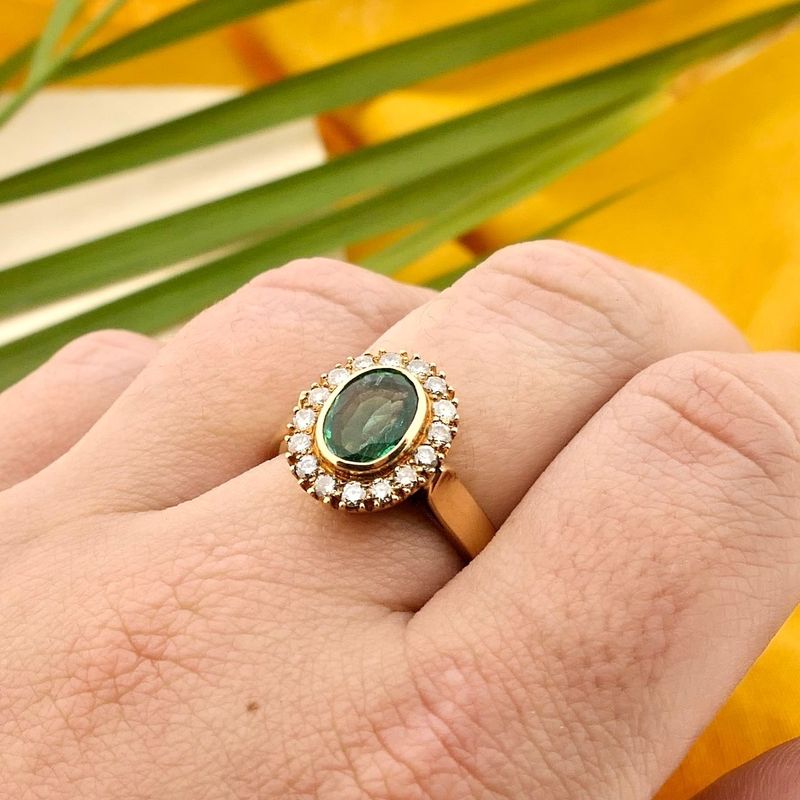 Image 4 of Gold ring with emerald and diamonds; 0.32 ct.